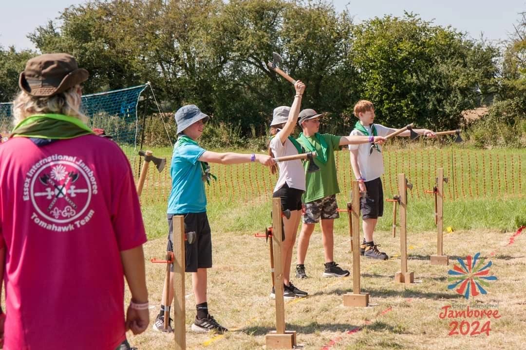 1st Lyonsdown taking part in axe throwing at the 2024 essex jamboree